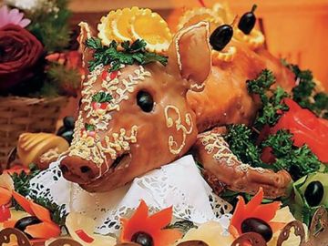 Поросёнок жаренный на вертеле